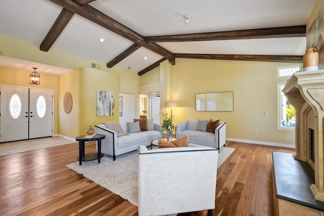 4956 Lamia Way, Oceanside, CA 92056 - living area featuring wood finished floors, a fireplace with raised hearth, and recessed lighting
