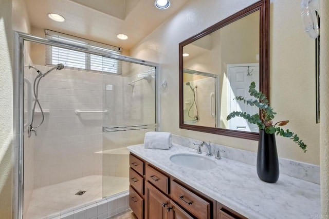 4956 Lamia Way, Oceanside, CA 92056 - bathroom with a shower stall, vanity, and recessed lighting
