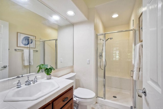 4956 Lamia Way, Oceanside, CA 92056 - bathroom featuring a shower stall, vanity, and recessed lighting