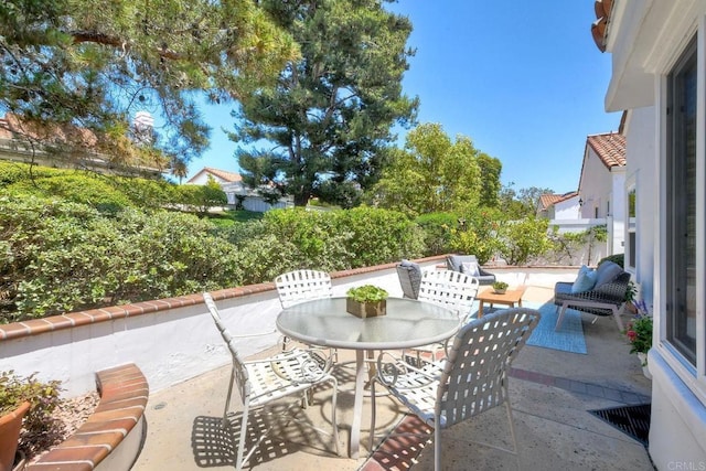 4956 Lamia Way, Oceanside, CA 92056 - fenced backyard with a patio area and outdoor dining area