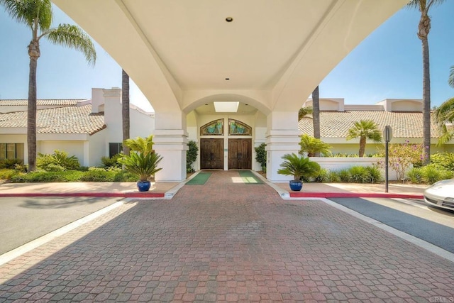 4956 Lamia Way, Oceanside, CA 92056 - entrance to property with stucco siding and uncovered parking