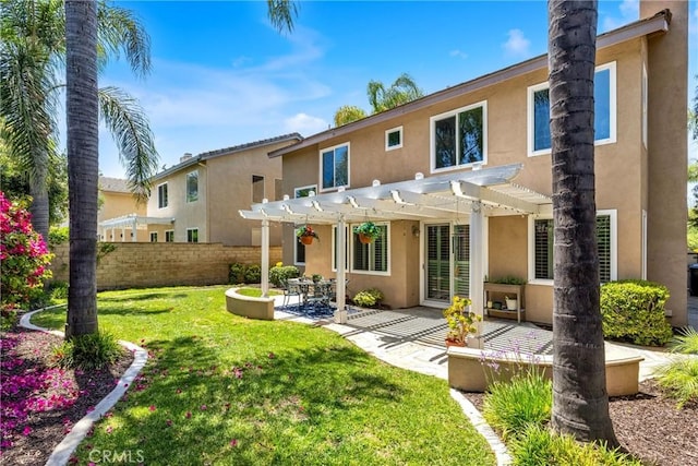 18 Argento, Mission Viejo, CA 92692 - rear view of house with stucco siding, a pergola, and a patio area