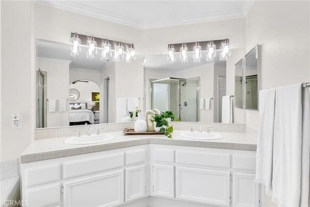 18 Argento, Mission Viejo, CA 92692 - ensuite bathroom featuring a shower stall, double vanity, and crown molding