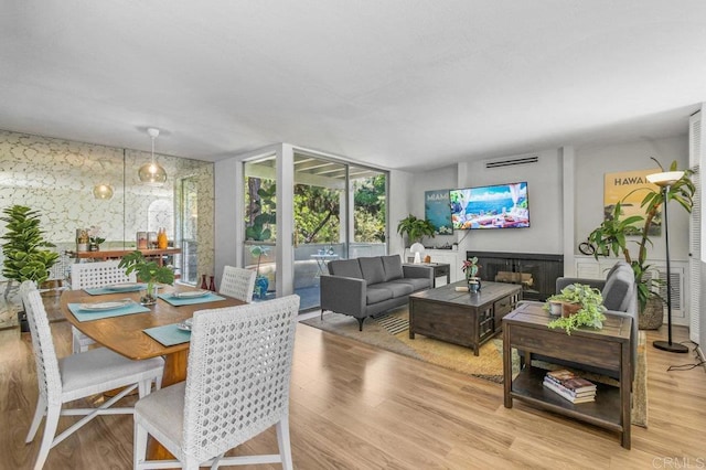 4833 Collwood Blvd Unit A, San Diego, CA 92115 - dining space featuring wood finished floors and a fireplace