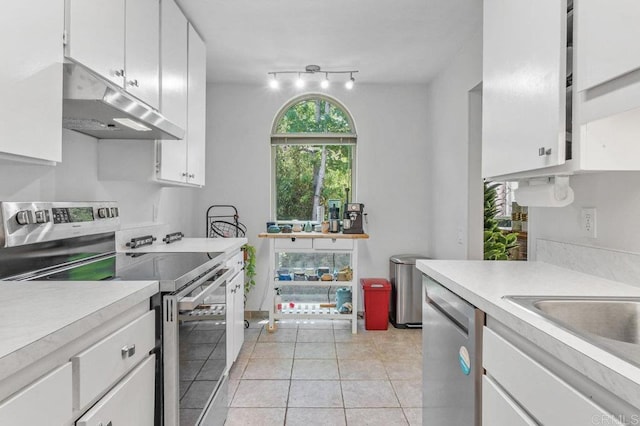 4833 Collwood Blvd Unit A, San Diego, CA 92115 - kitchen featuring appliances with stainless steel finishes, under cabinet range hood, light countertops, and white cabinetry