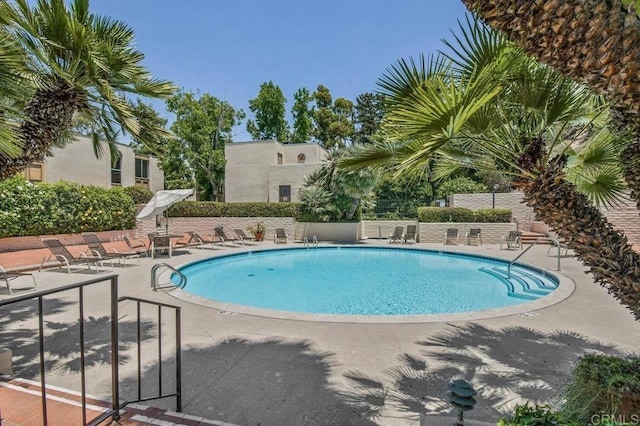 4833 Collwood Blvd Unit A, San Diego, CA 92115 - community pool featuring a patio area
