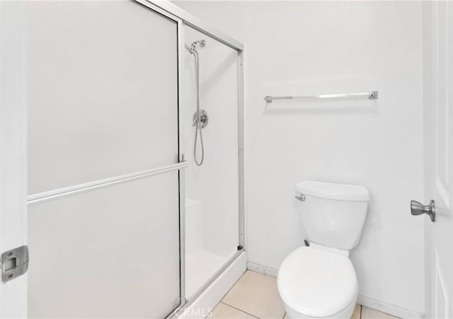 11714 Oak St, Apple Valley, CA 92308 - bathroom featuring a shower stall and tile patterned flooring