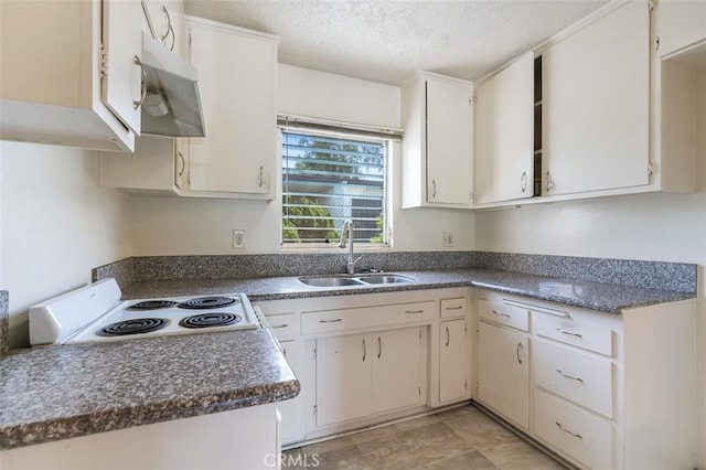 820 N Raymond Ave, Pasadena, CA 91103 - kitchen with electric range, a textured ceiling, and dark countertops