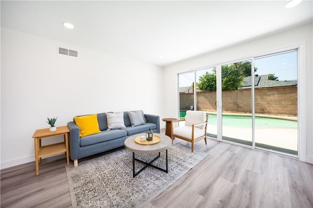 1019 E Armstead St, Azusa, CA 91702 - living room with wood finished floors and recessed lighting