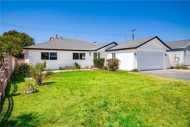 1019 E Armstead St, Azusa, CA 91702 - ranch-style house with a garage, asphalt driveway, and stucco siding