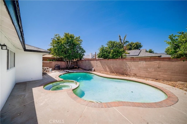 1019 E Armstead St, Azusa, CA 91702 - view of pool featuring a fenced backyard, a patio, and a pool with connected hot tub