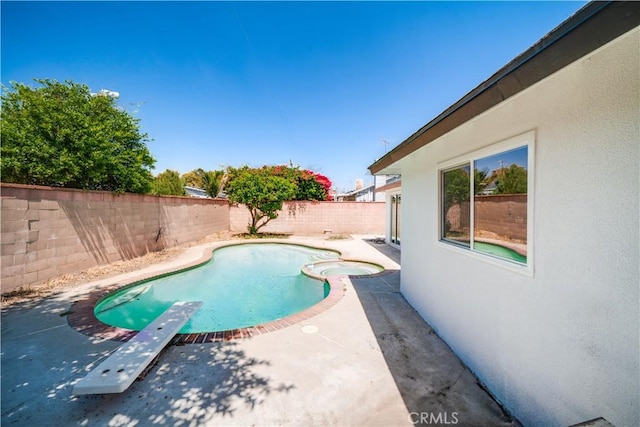 1019 E Armstead St, Azusa, CA 91702 - view of pool with a fenced backyard, a patio area, a diving board, and a pool with connected hot tub