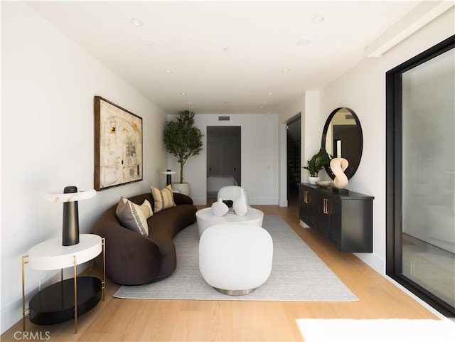 1313 Ocean Ave, Seal Beach, CA 90740 - living room with light wood-style flooring and recessed lighting