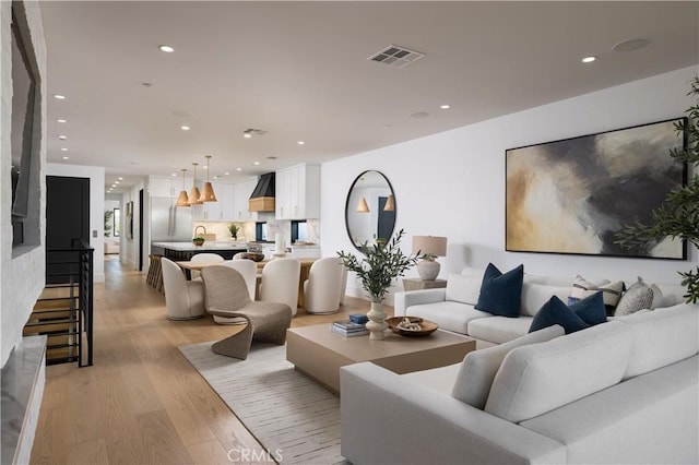 1315 Ocean Ave, Seal Beach, CA 90740 - living area featuring light wood-type flooring, recessed lighting, and healthy amount of natural light