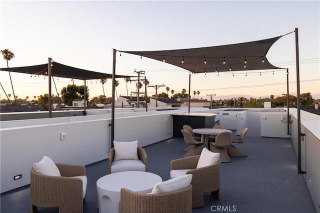 1315 Ocean Ave, Seal Beach, CA 90740 - patio terrace at dusk with outdoor dining area