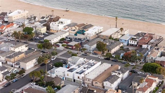 1315 Ocean Ave, Seal Beach, CA 90740 - aerial view of property and surrounding area featuring waterfront with a beach and nearby suburban area