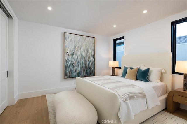 1315 Ocean Ave, Seal Beach, CA 90740 - bedroom featuring light wood-style flooring, recessed lighting, and multiple windows