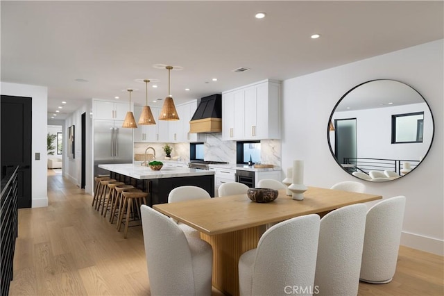 1315 Ocean Ave, Seal Beach, CA 90740 - dining area with light wood finished floors, recessed lighting, and beverage cooler