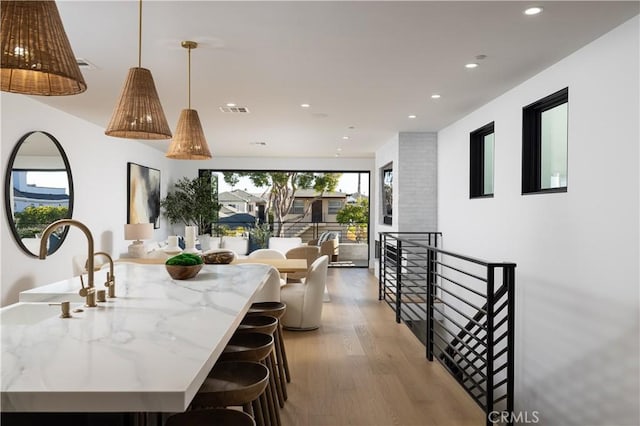 1315 Ocean Ave, Seal Beach, CA 90740 - dining space with light wood finished floors and recessed lighting