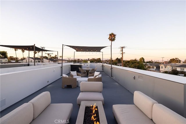 1315 Ocean Ave, Seal Beach, CA 90740 - patio terrace at dusk with an outdoor living space with a fire pit