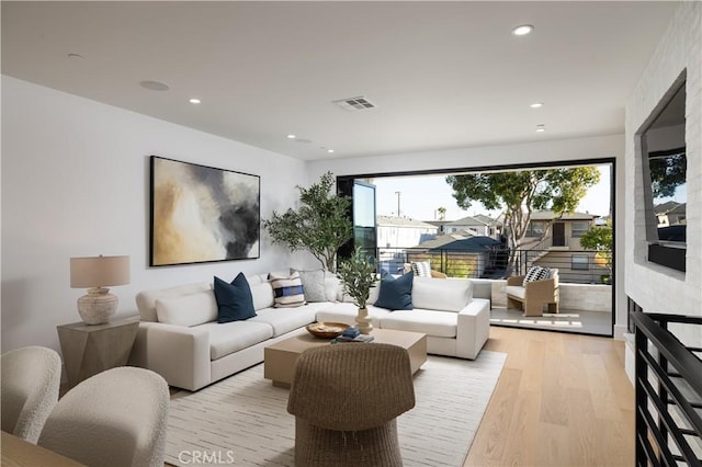 1315 Ocean Ave, Seal Beach, CA 90740 - living area with light wood-style flooring and recessed lighting