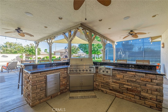 2534 Desert Rose Dr, Lancaster, CA 93536 - view of patio featuring a ceiling fan and area for grilling