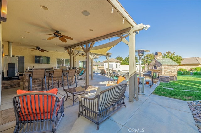 2534 Desert Rose Dr, Lancaster, CA 93536 - view of patio with an outdoor living space and a ceiling fan
