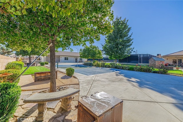 2534 Desert Rose Dr, Lancaster, CA 93536 - view of patio / terrace featuring a tennis court