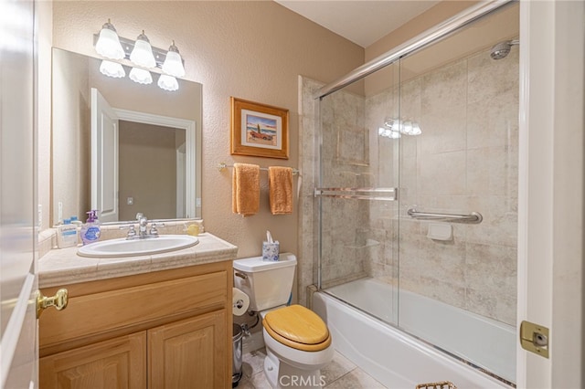 2534 Desert Rose Dr, Lancaster, CA 93536 - full bath with vanity, enclosed tub / shower combo, a textured wall, and tile patterned floors