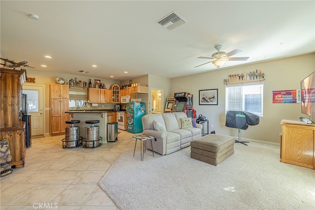 2534 Desert Rose Dr, Lancaster, CA 93536 - living area with ceiling fan, recessed lighting, and light tile patterned flooring