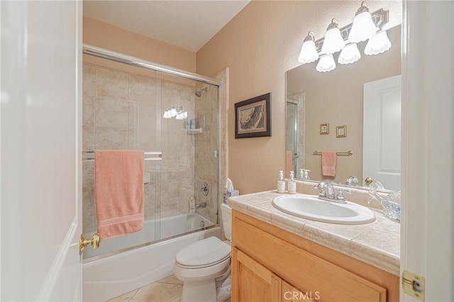 2534 Desert Rose Dr, Lancaster, CA 93536 - bathroom featuring vanity, bath / shower combo with glass door, tile patterned floors, a textured wall, and a chandelier