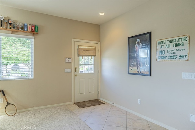 2534 Desert Rose Dr, Lancaster, CA 93536 - doorway to outside featuring light tile patterned flooring and recessed lighting