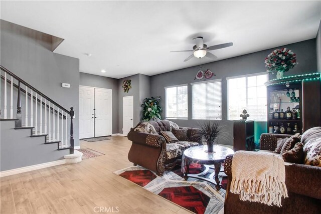 26810 Sugarite Canyon Dr, Moreno Valley, CA 92555 - living area with a ceiling fan, stairway, wood finished floors, and recessed lighting