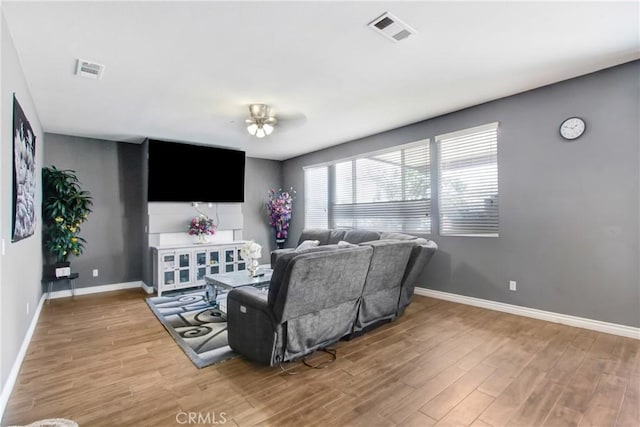 26810 Sugarite Canyon Dr, Moreno Valley, CA 92555 - living room featuring light wood-type flooring and ceiling fan