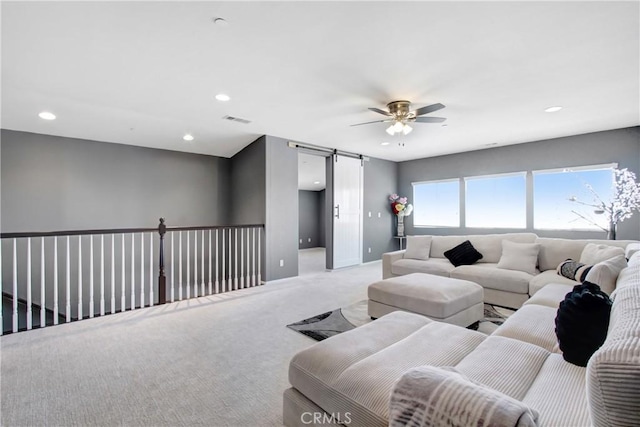 26810 Sugarite Canyon Dr, Moreno Valley, CA 92555 - living area featuring a ceiling fan, carpet floors, a barn door, and recessed lighting