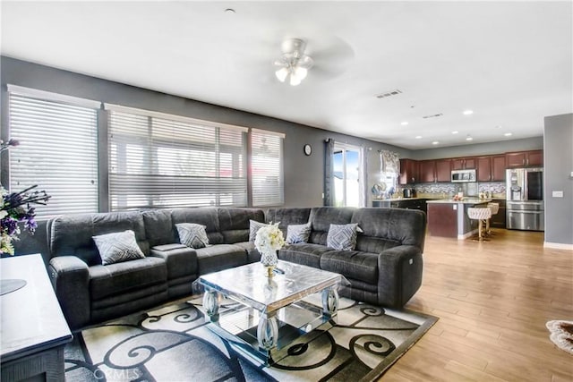 26810 Sugarite Canyon Dr, Moreno Valley, CA 92555 - living room featuring light wood finished floors, ceiling fan, and recessed lighting