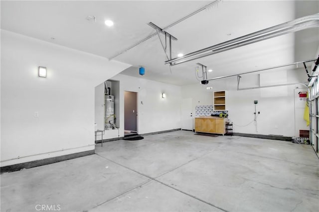 26810 Sugarite Canyon Dr, Moreno Valley, CA 92555 - garage with water heater and a garage door opener