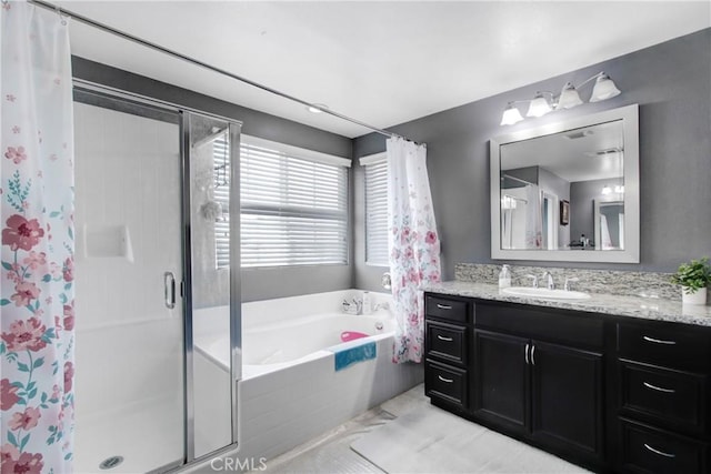26810 Sugarite Canyon Dr, Moreno Valley, CA 92555 - full bath featuring a shower stall, vanity, and a garden tub