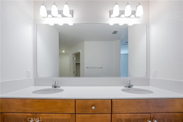 363 Arpent Ct, Merced, CA 95341 - bathroom featuring double vanity