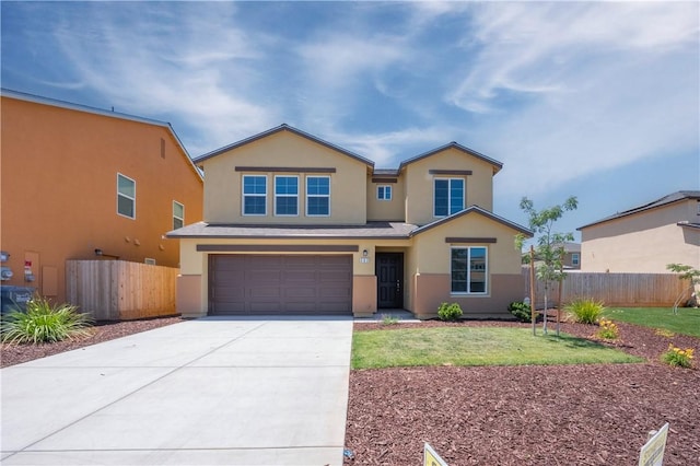 363 Arpent Ct, Merced, CA 95341 - traditional home with stucco siding, driveway, and an attached garage