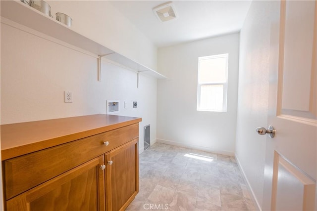 363 Arpent Ct, Merced, CA 95341 - laundry room featuring hookup for an electric dryer, washer hookup, and cabinet space