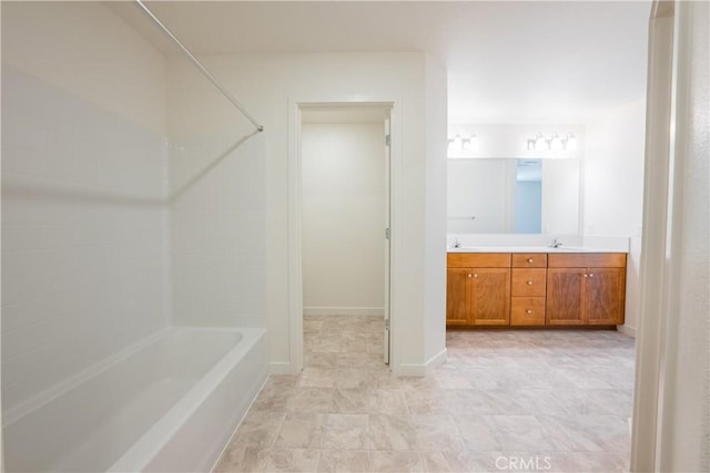 363 Arpent Ct, Merced, CA 95341 - bathroom featuring double vanity and shower / bath combination