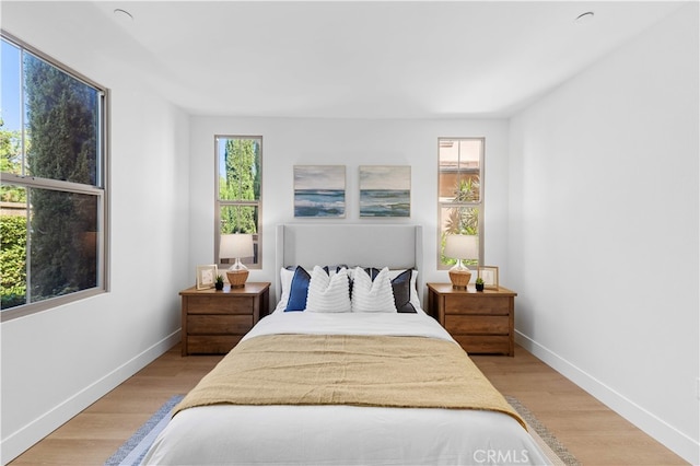 186 Bishop Lndg, Irvine, CA 92620 - bedroom featuring light wood-style flooring