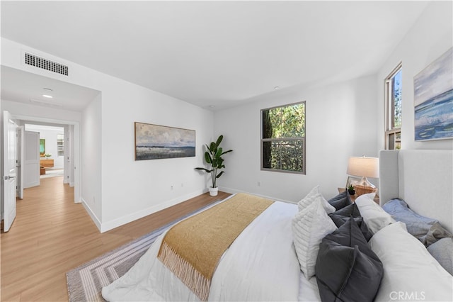 186 Bishop Lndg, Irvine, CA 92620 - bedroom with light wood-style floors and recessed lighting