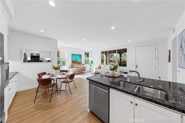 186 Bishop Lndg, Irvine, CA 92620 - kitchen featuring stainless steel dishwasher, white cabinetry, light wood-style flooring, and recessed lighting