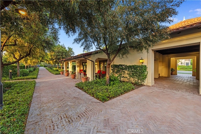 186 Bishop Lndg, Irvine, CA 92620 - view of front of house with stucco siding and a tile roof