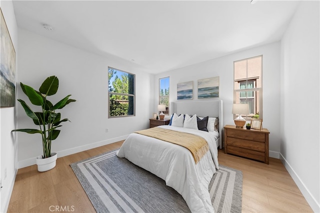 186 Bishop Lndg, Irvine, CA 92620 - bedroom with light wood-type flooring and baseboards