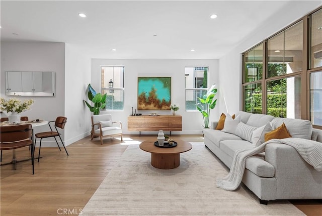 186 Bishop Lndg, Irvine, CA 92620 - living room featuring light wood finished floors and recessed lighting