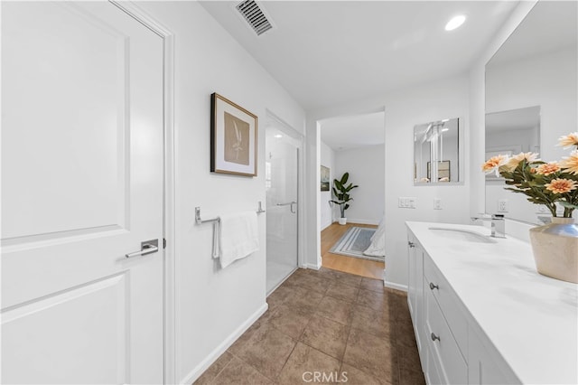 186 Bishop Lndg, Irvine, CA 92620 - full bathroom featuring vanity, tile patterned flooring, and a shower with door