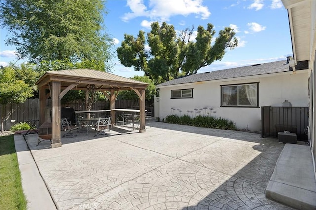 1094 Manzanita Ave, Chico, CA 95926 - view of patio / terrace with a gazebo and outdoor dining space